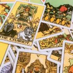 A colorful spread of various tarot cards perfect for divination and spiritual guidance.