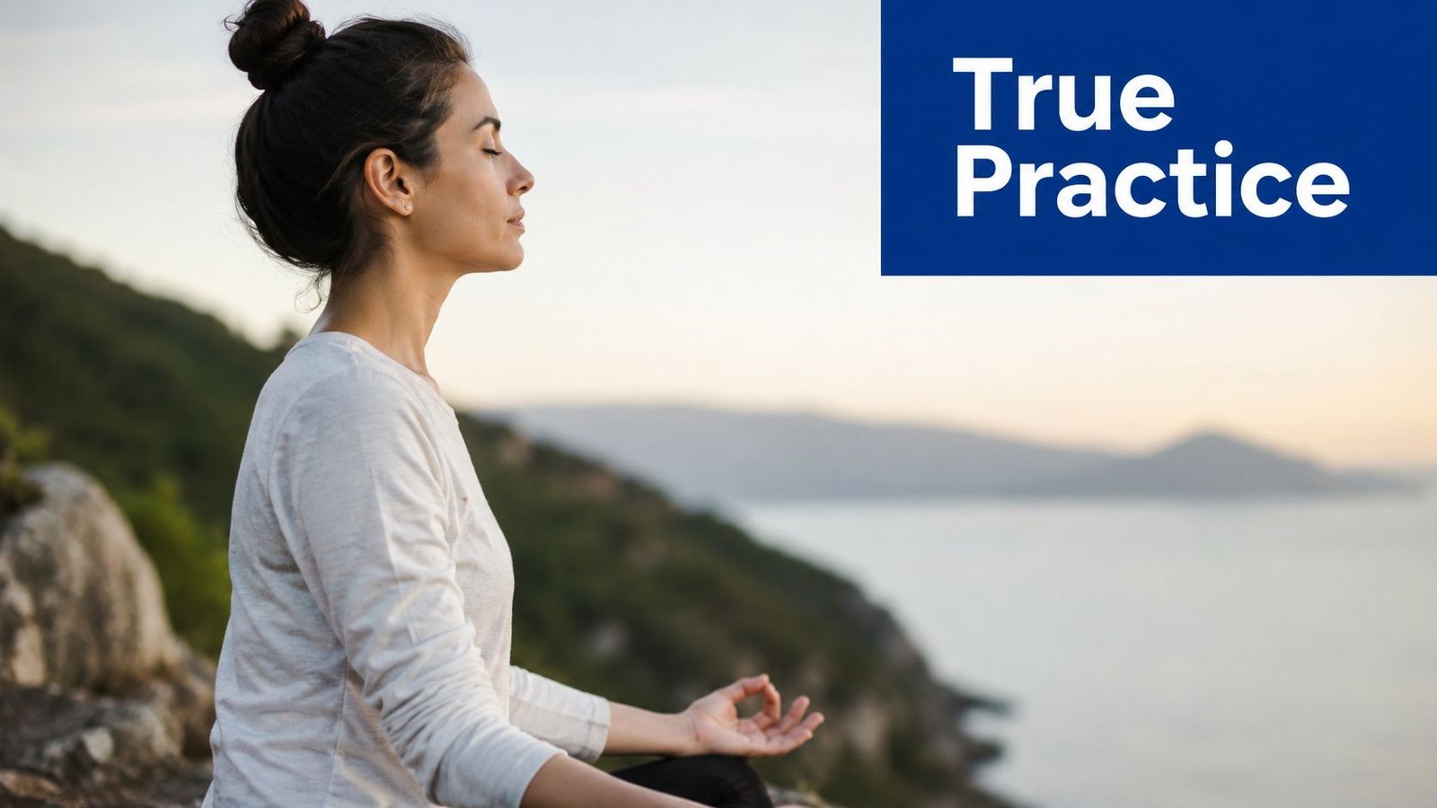 A young woman sitting in a meditative pose overlooking a calm ocean at sunset.